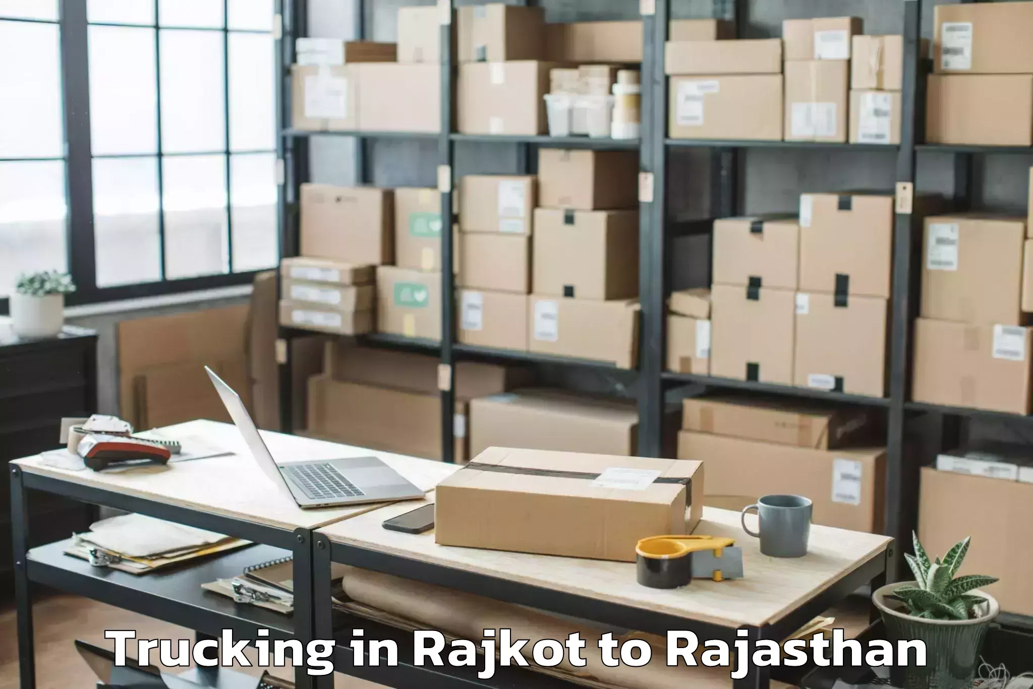 Book Rajkot to Ladnu Trucking Online